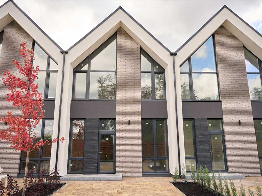 vfronts-of-modern-houses-lined-up-to-each-other